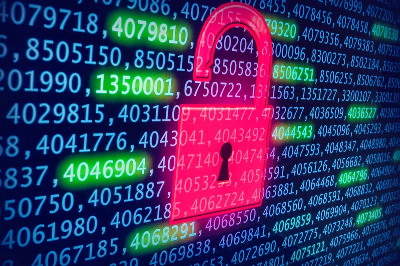 Digital padlock on a circuit board representing cyber insurance and cybersecurity protection requirements