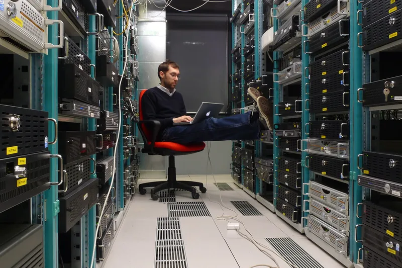 Server rack equipment in a data center requiring regular IT maintenance and cooling checks